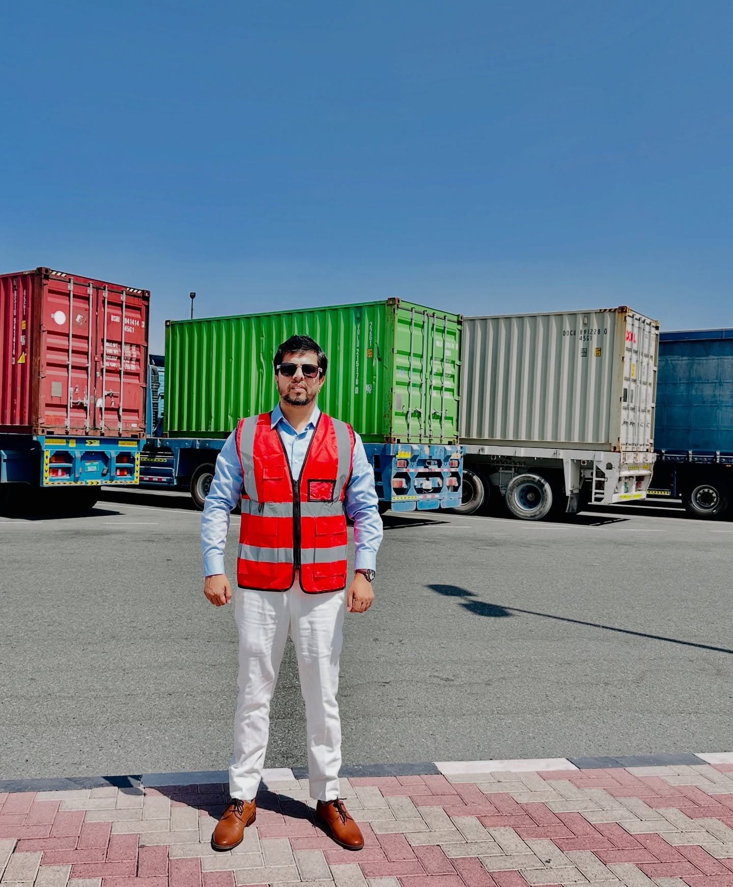 Kiran Wagh in Front of Trailers